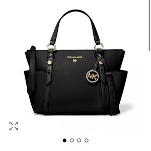 New with tags Michael Kors Nomad Leather tote in black.